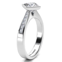 Nash diamond ring, side view showing channel set diamonds on the shoulder 