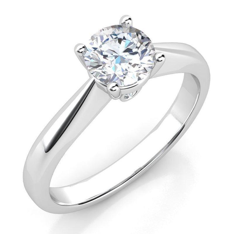 Nicolette in platinum: Classic diamond solitaire ring with diamond accents
