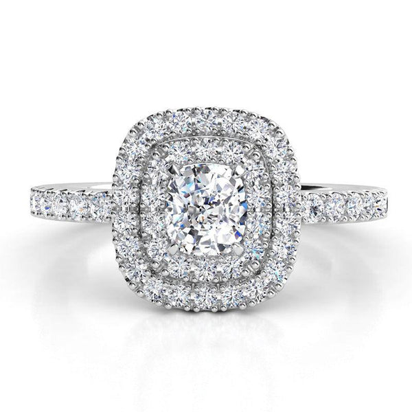 Norah in platinum - Cushion cut double halo diamond engagement ring with diamonds on the band