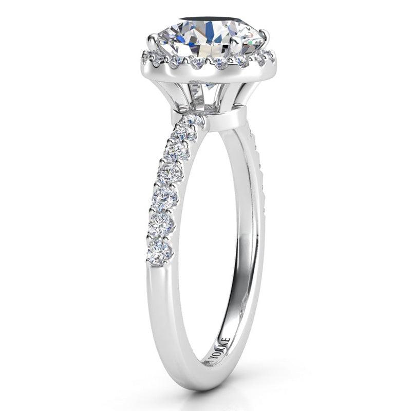 Unique Diamond Halo Ring in platinum. Orion. Side View showing the beautiful detail of this design. 