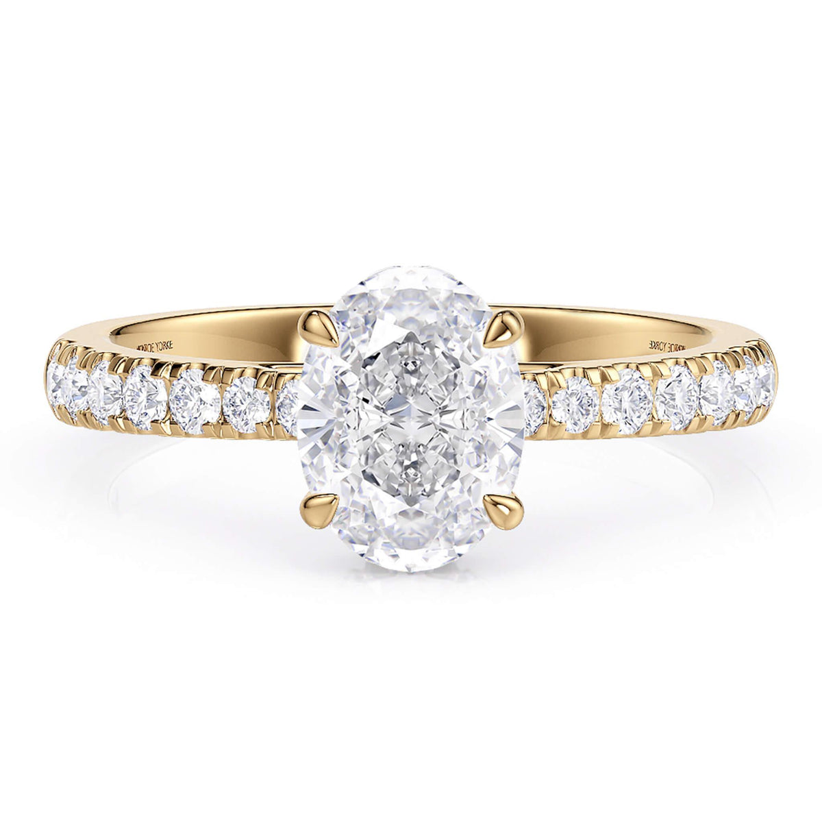Oval diamond engagement ring in yellow gold.  Hidden halo under the main diamond around the girdle of the diamond.  Centre diamond in a 4 claw setting  — view 2