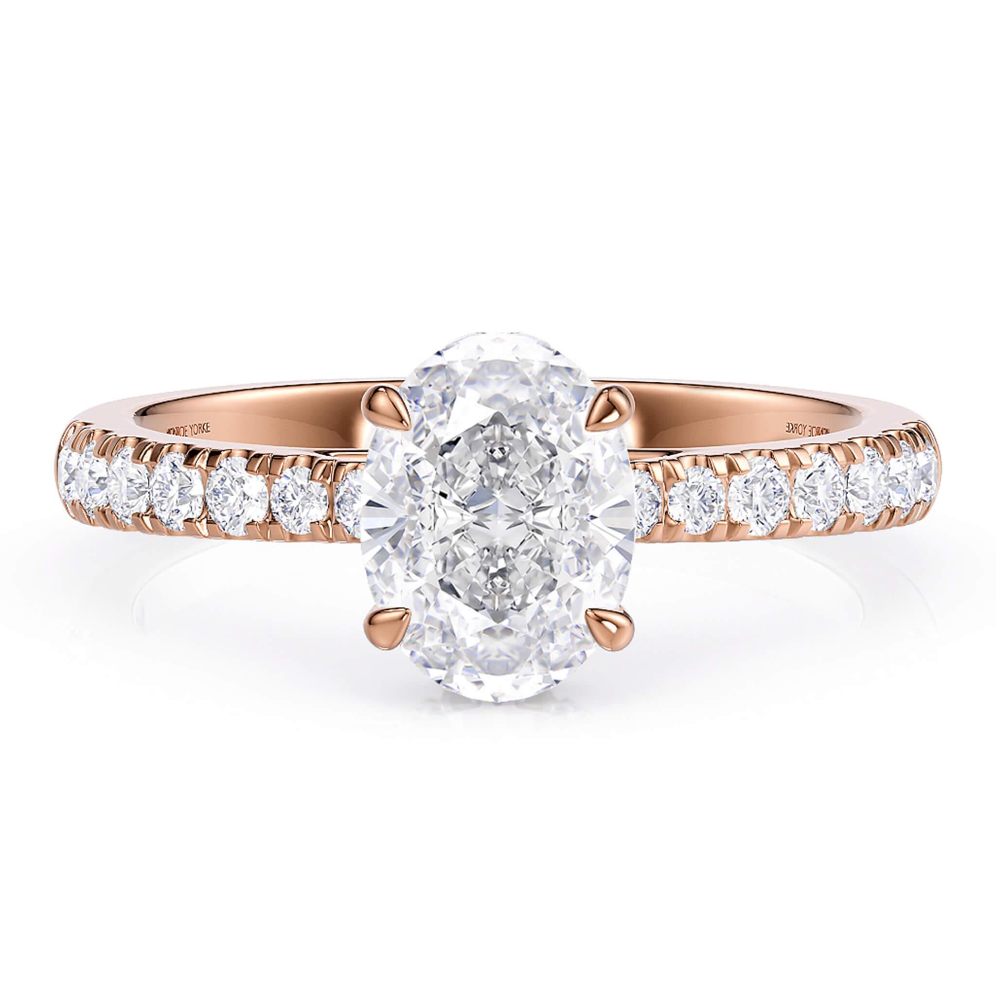 Paige Oval diamond ring. Band tapers into the centre setting. 