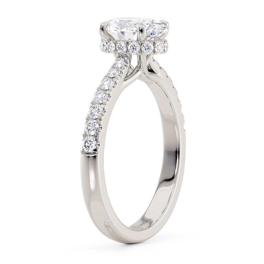 Side view of the Paige oval diamond ring showing the beautiful hidden halo of diamonds