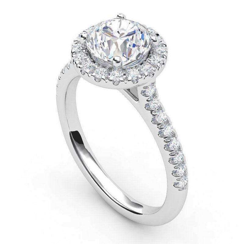  Paris in platinum - diamond halo engagement ring with diamonds down the band. 