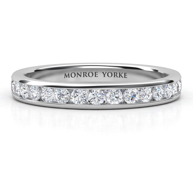 Desiree channel set diamond ladies wedding ring. Available in white gold, yellow gold, rose gold or platinum