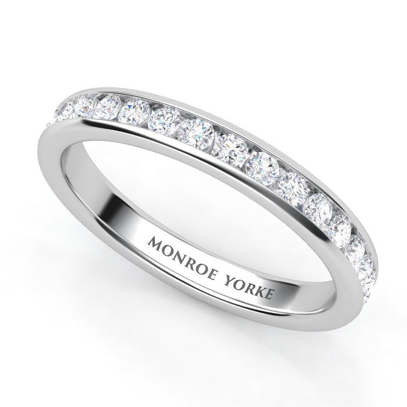 Desiree channel set diamond ladies wedding ring. Available in white gold, yellow gold, rose gold or platinum