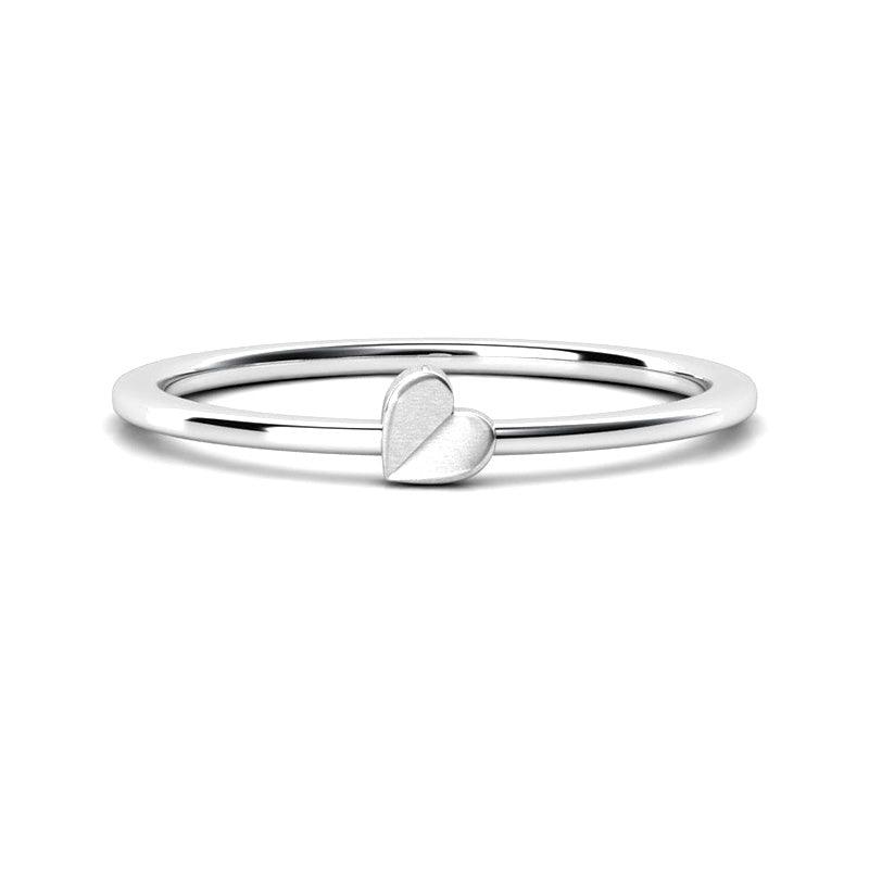 Small heart ring in 18ct white gold.  Petit heart ring from our Petit collection. Stack ring. 