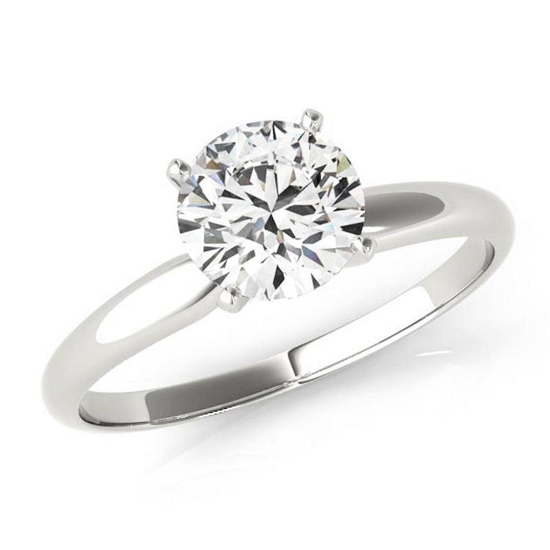 Promise in platinum - Round diamond 4 claw solitaire ring. 