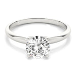 The Promise in platinum - 4 claw round solitaire diamond ring.  