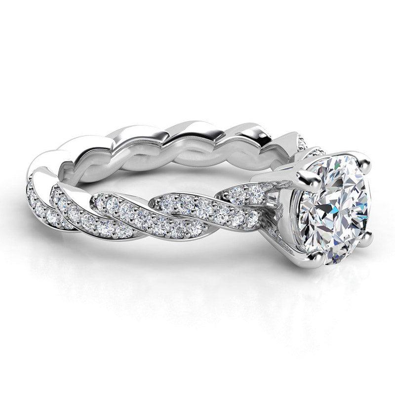 Quinn in platinum - Unique round diamond ring.  Side view showing the braided band
