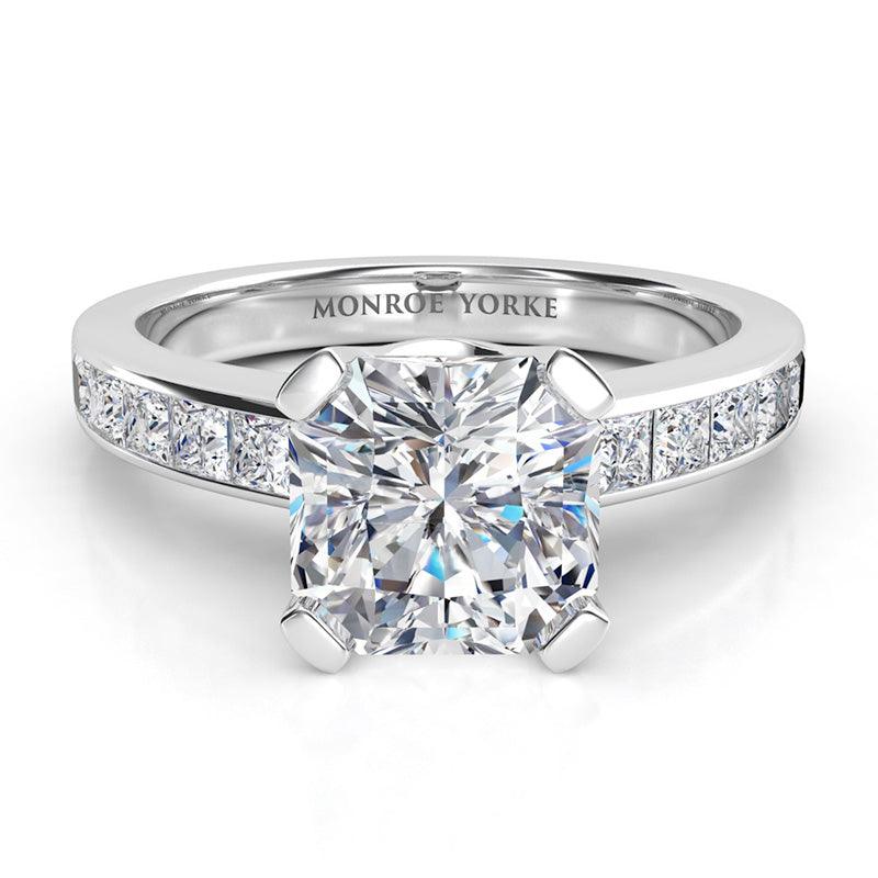 Stunning Radiance - radiant cut centre diamond, channel set princess cut diamonds on the band.  