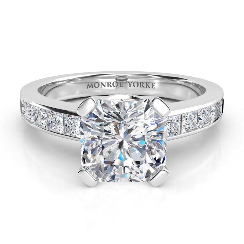 Radiance in platinum - radiant cut centre diamond, channel set princess cut diamonds on the band.  