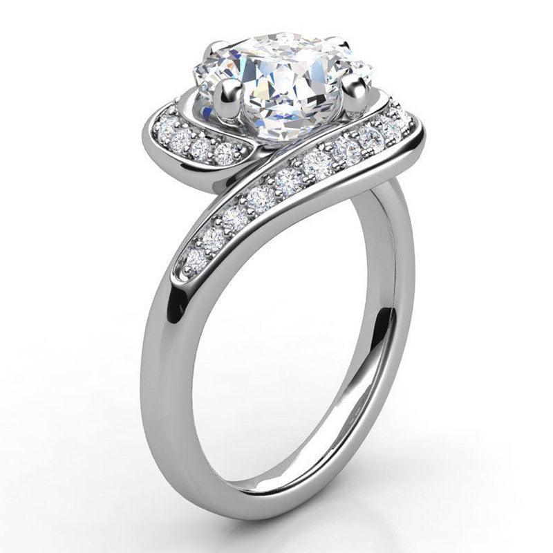 Reese in Platinum - Cushion cut diamond ring.  Side view showing the wrap around band