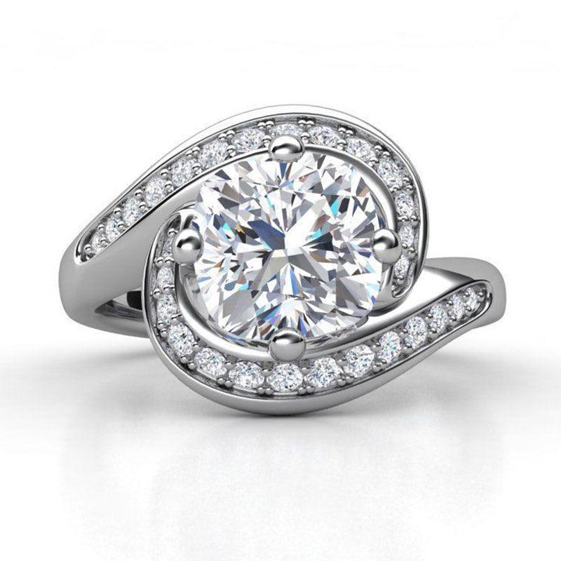 Reese in platinum - Unique cushion cut diamond Halo engagement ring.