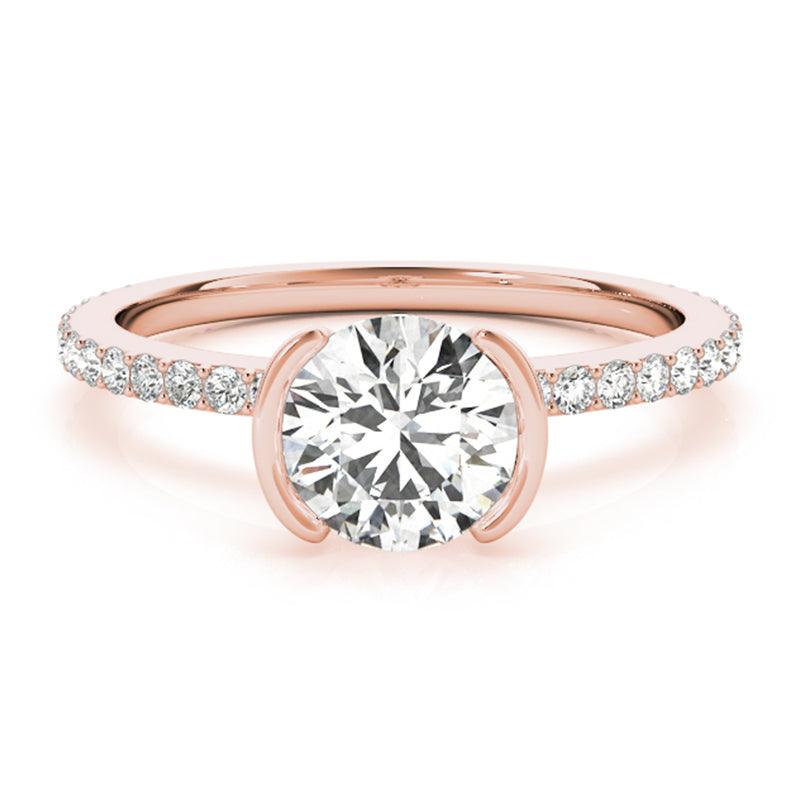 Unique rose gold round diamond engagement ring. 