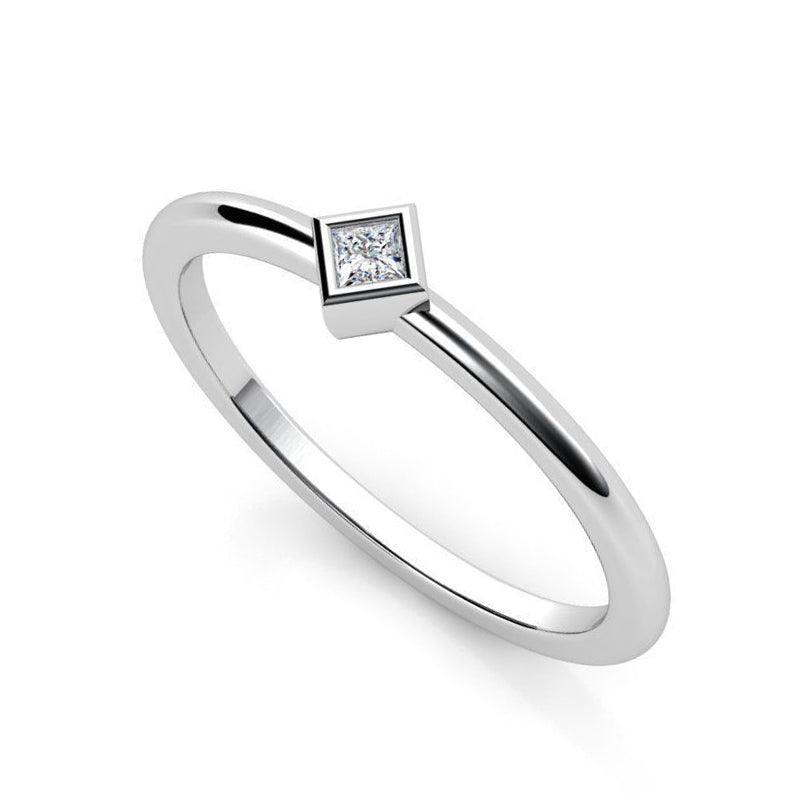 Princess cut diamond dress ring.  Elegant bezel setting