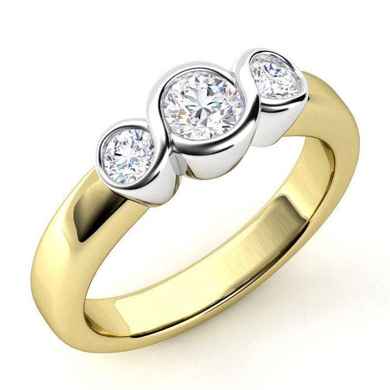 Roux - Three Stone Diamond Ring. Total 0.40 carats. Round Diamonds. Yellow gold band and white gold setting. 
