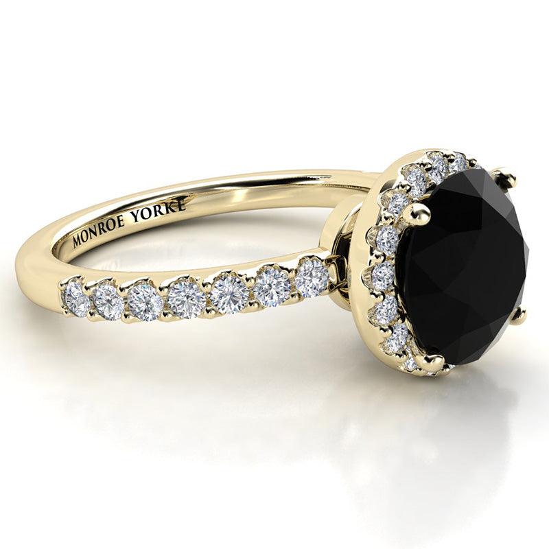 Gold Black Diamond ring with a unique halo ring