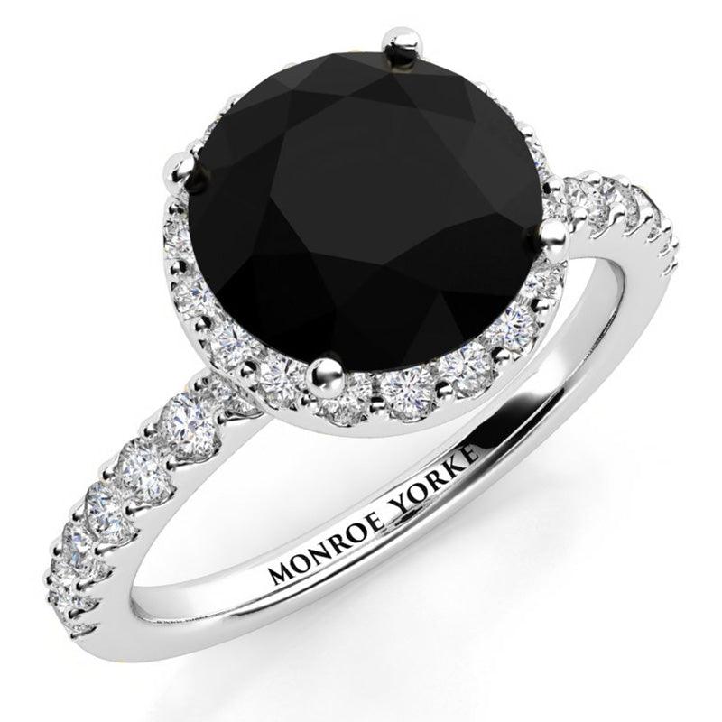 Sasha - Black Diamond Ring with a Unique halo of white diamonds and diamonds down the band. White Gold 