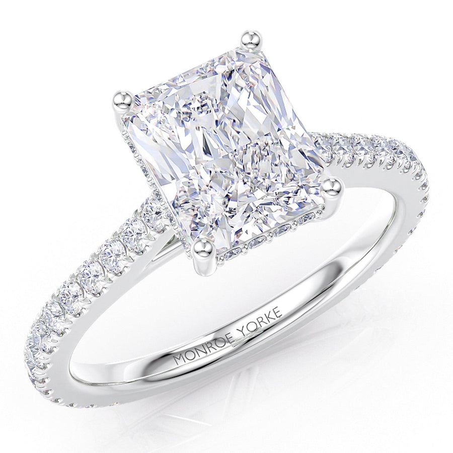 Top view of Seville - Radiant cut diamond engagement ring with a hidden halo of diamonds and diamonds on the band