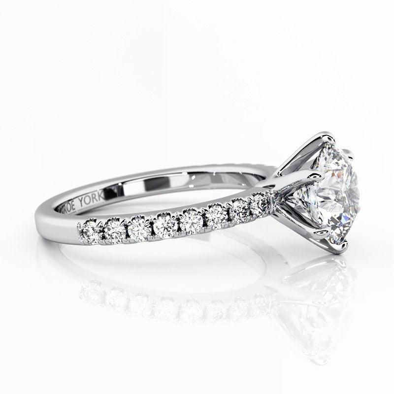Scarlett 6 Claw Setting in platinum - side view showing the elegant centre setting and diamonds on the band