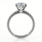 Scarlett in platinum- side view 3 showing the elegant centre setting and diamonds on the band.