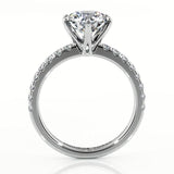 Scarlett in platinum- side view 3 showing the elegant centre setting and diamonds on the band.