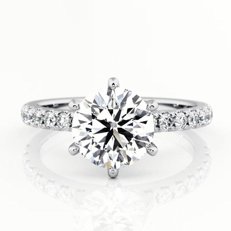 Scarlett in platinum - round diamond engagement ring. Centre 6 claw setting