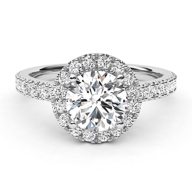 Serene - Front view. Round diamond halo engagement ring in platinum.  Centre GIA certified round diamond. 