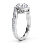 Side view 2 showing the unique halo that wraps the centre round diamond. Tempest, created in platinum. 