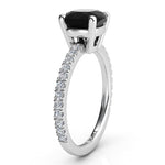 Storm - Side view showing centre secure basket setting and white diamonds down the band. 