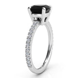 Storm - Side view showing centre secure basket setting and white diamonds down the band. 