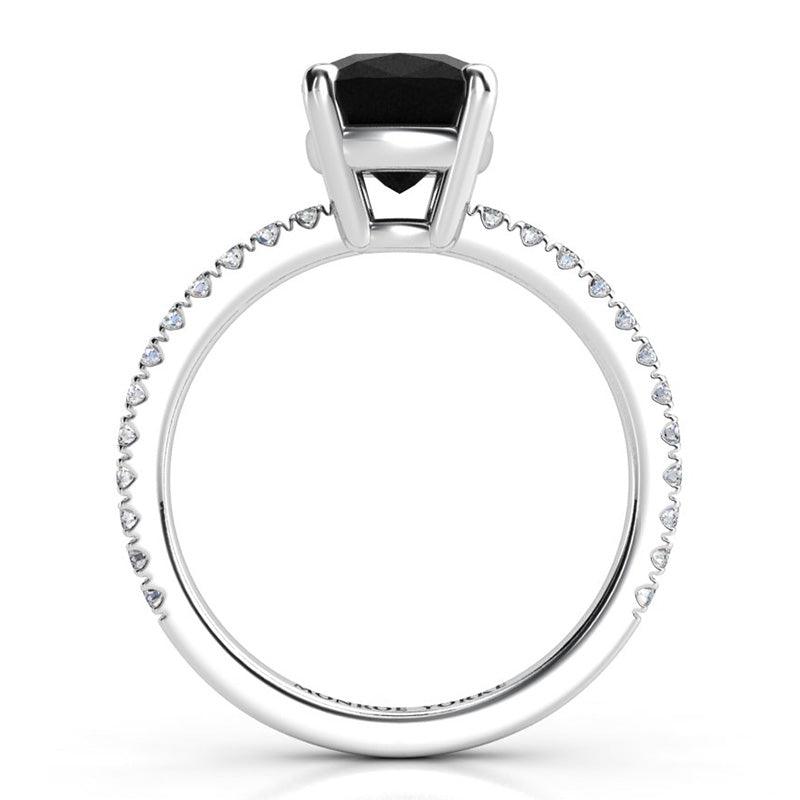 Storm - Side view showing beautiful centre basket setting and white diamond set band. 