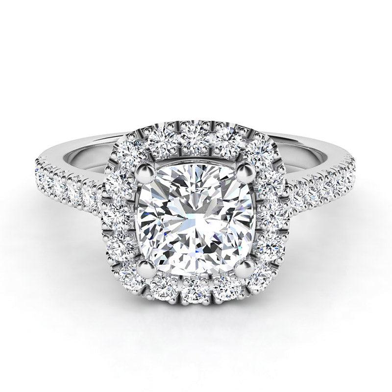 Summer in platinum - top view, centre cushion cut diamond with a halo of diamonds and diamond on the sweep up band