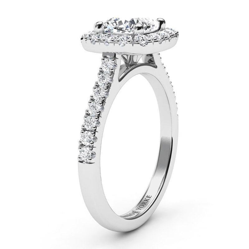 Summer - side view. Cushion cut diamond halo engagement ring with diamonds down the band.  18ct White Gold