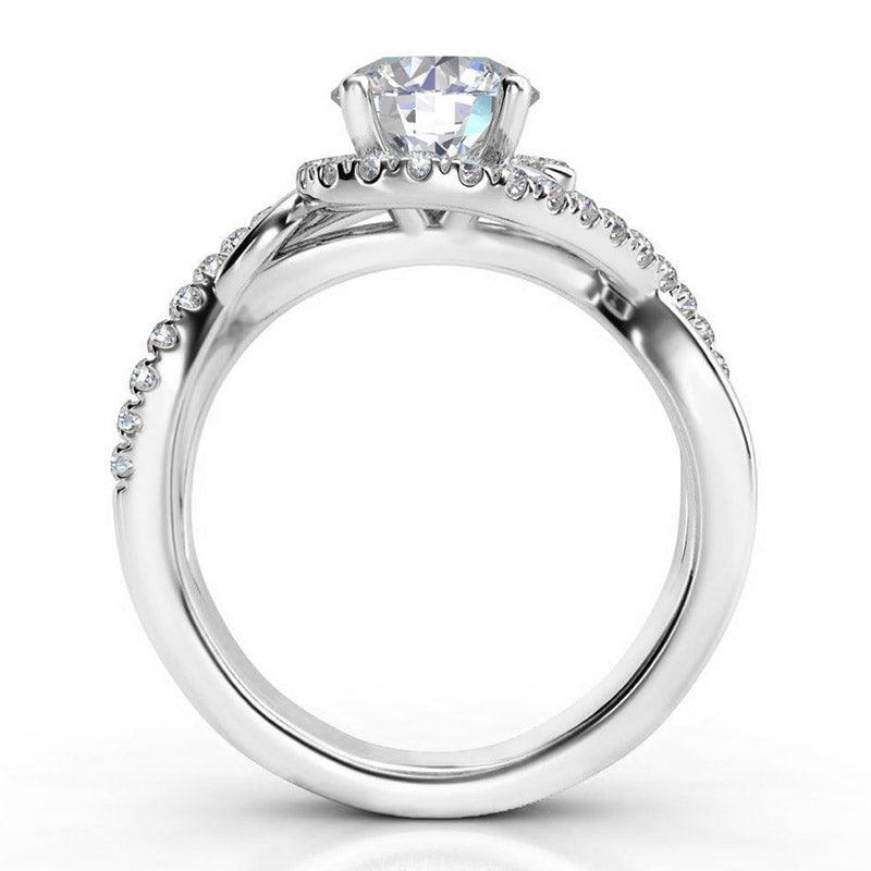 Tessa in platinum - Unique halo diamond ring.  Round centre diamond. Side view 2