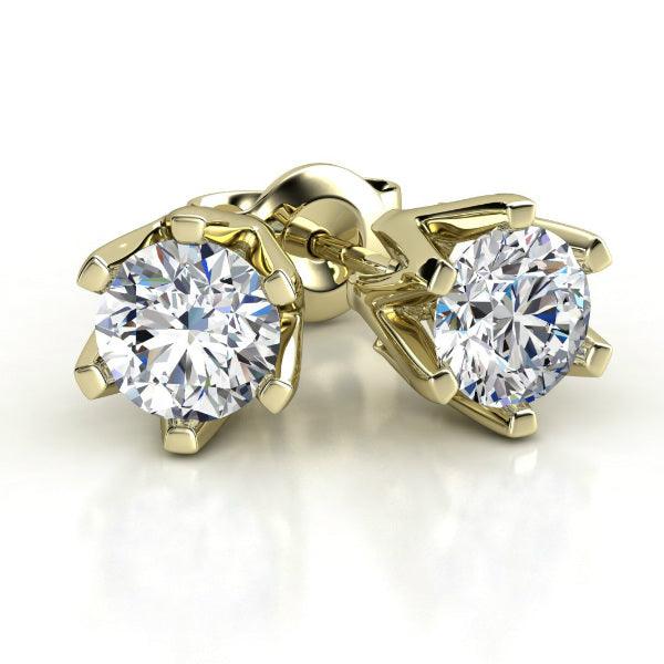 Gold Diamond stud earrings in 18ct yellow gold. Six claw setting with round diamonds. Total 0.20 carats 