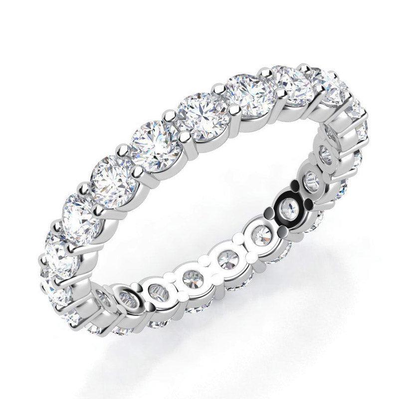 Venus - diamond wedding or eternity ring with diamonds all the way around the band.  Total diamond weight 1.00 carats.  White gold or platinum.