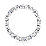 Venus - diamond wedding or eternity ring with diamonds all the way around the band.  Side view