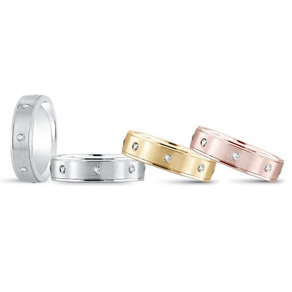 Zeus men's diamond wedding ring with gypsy set diamonds around the band.  Available in white gold, yellow gold rose gold or paltinum. 