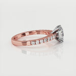 Kendall oval cut diamond engagement ring in rose gold.  Diamonds on the sweep up band. 